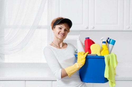 Local cleaning team working in a Camberwell office kitchen